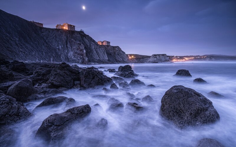 Cliffside homes at dusk