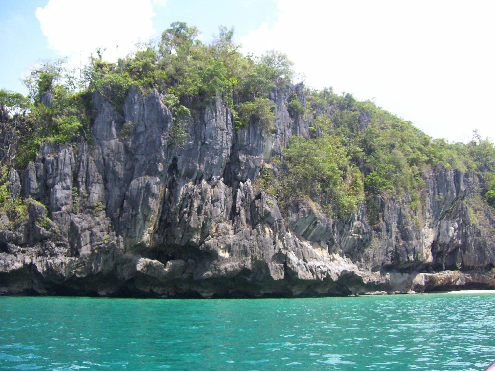 cliffside island with turquoise water
