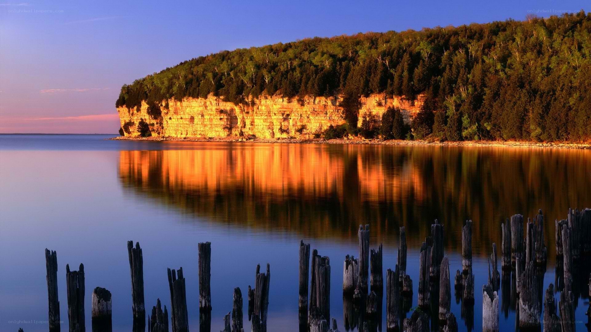 Cliffside lake at sunset