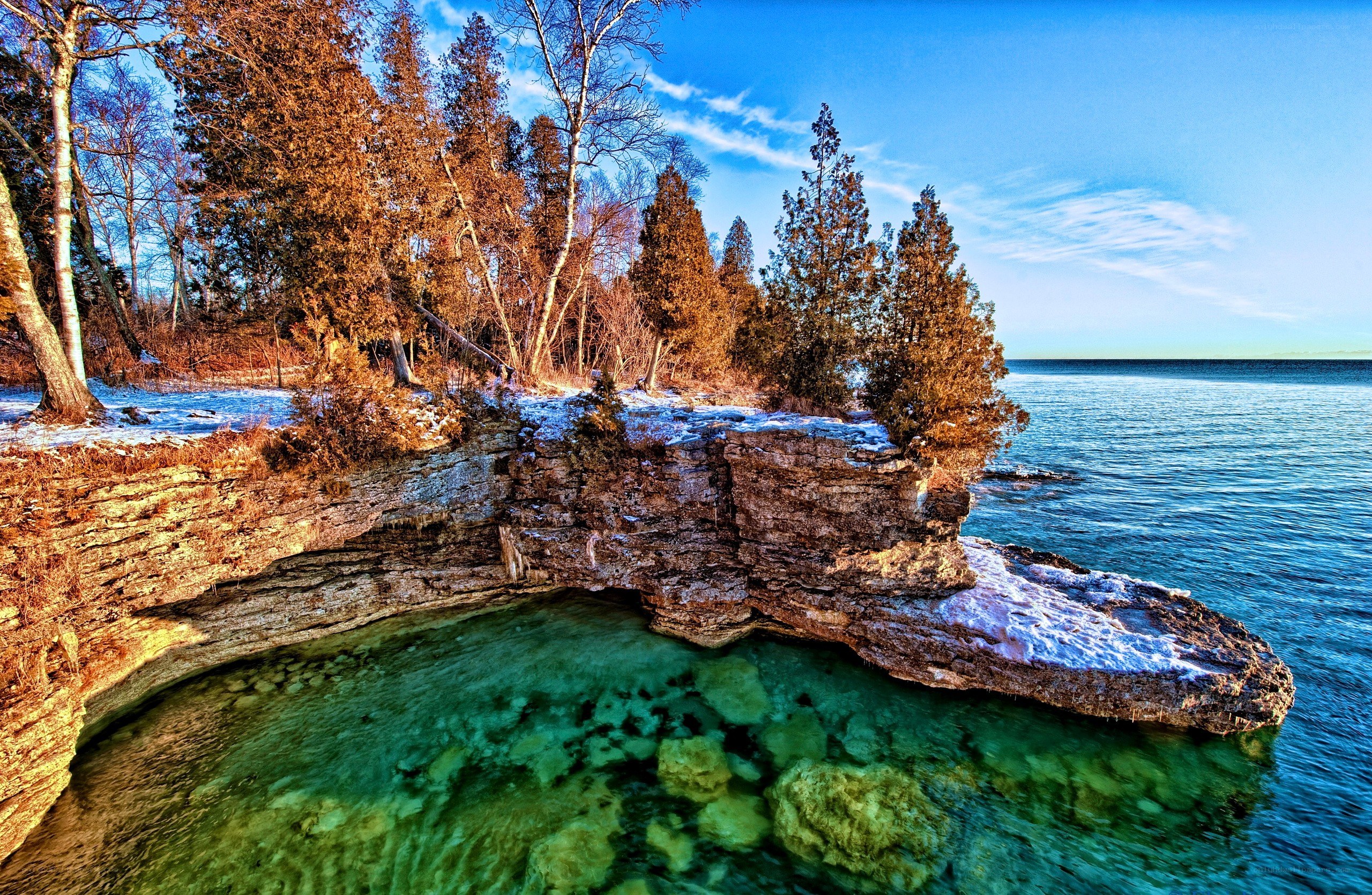 Cliffside lake with clear water