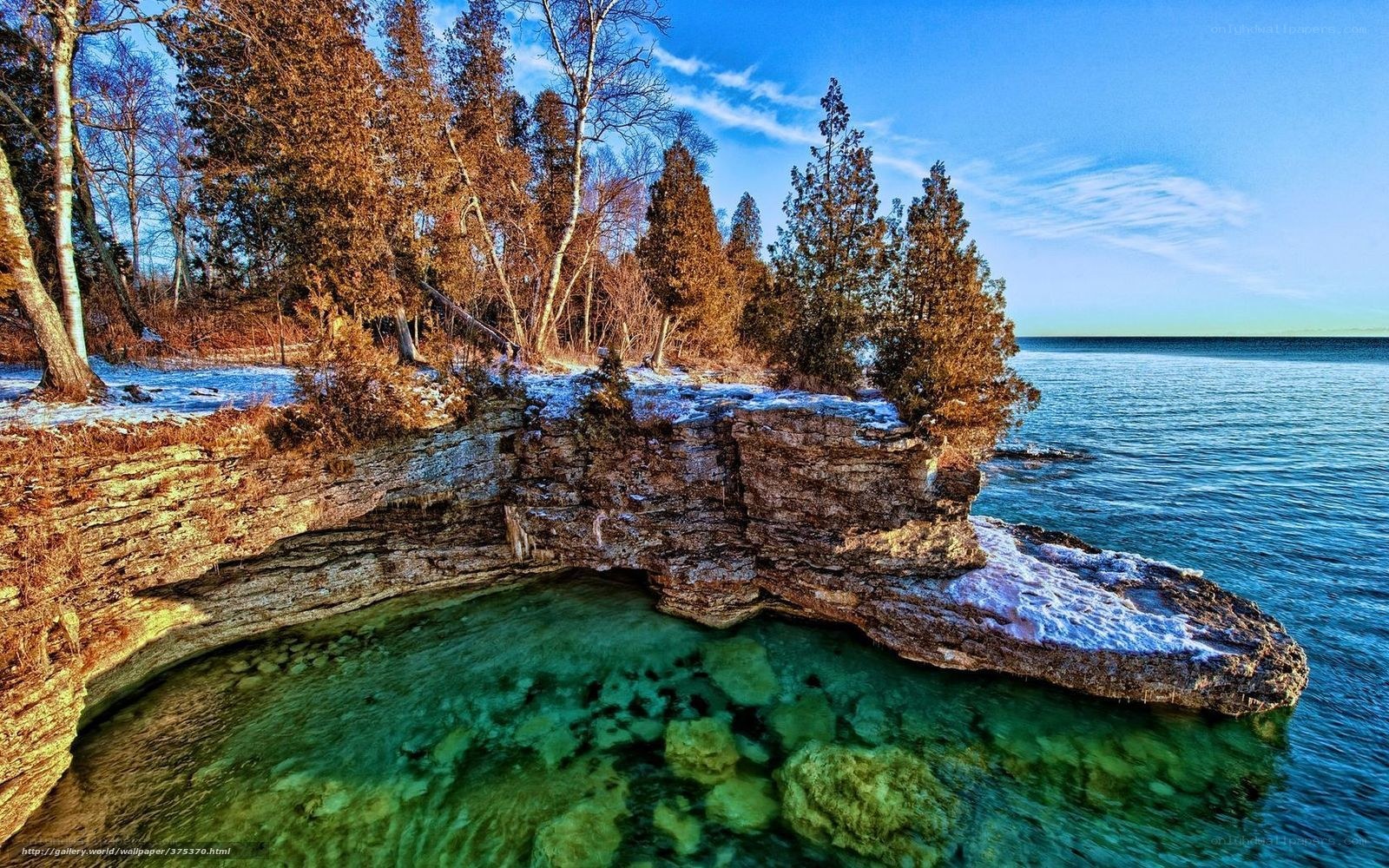 Cliffside lake with clear water