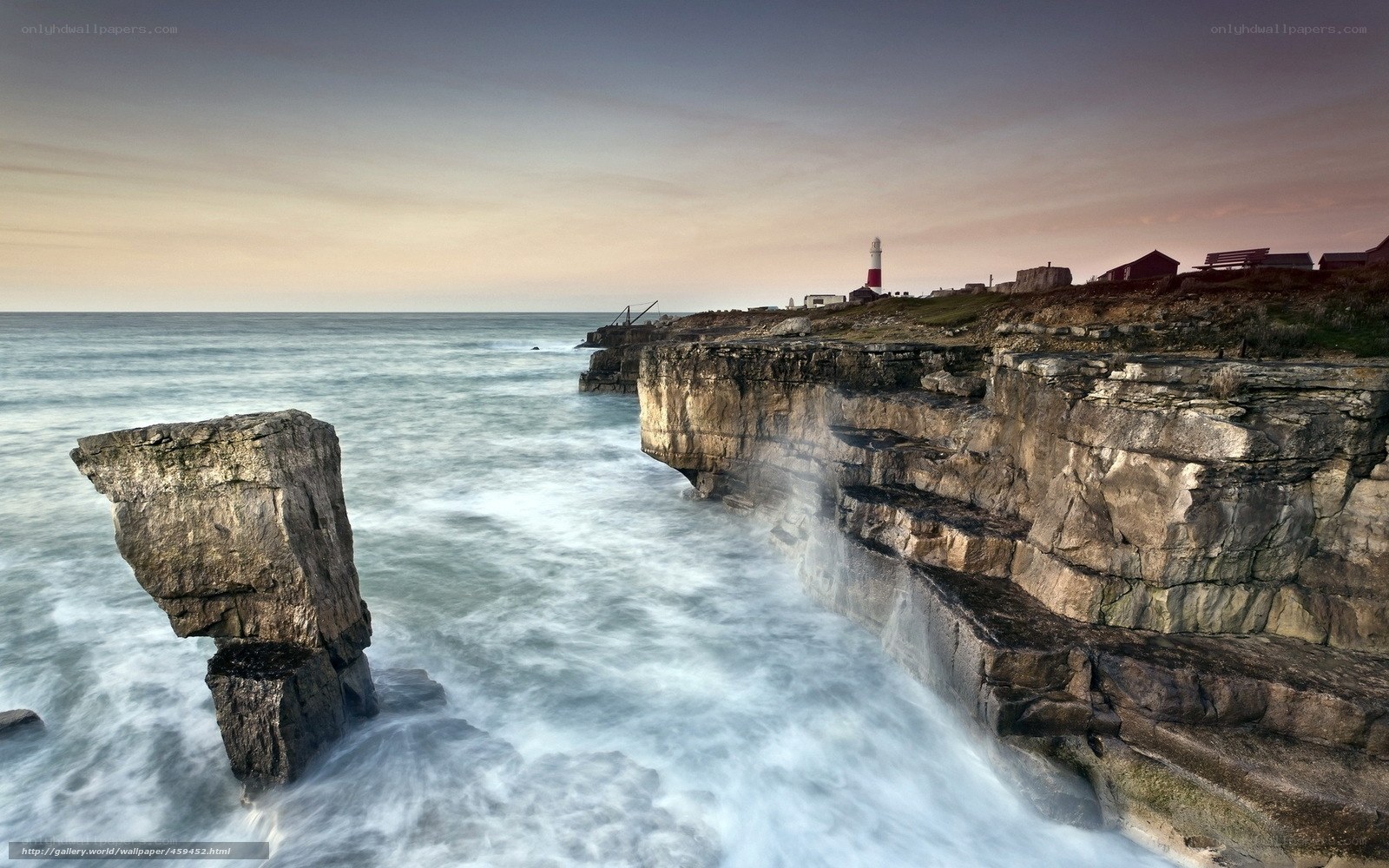 Cliffside lighthouse at dusk