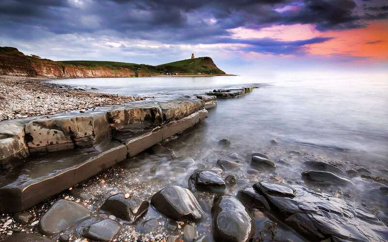 Cliffside Lighthouse at Sunset — Purple