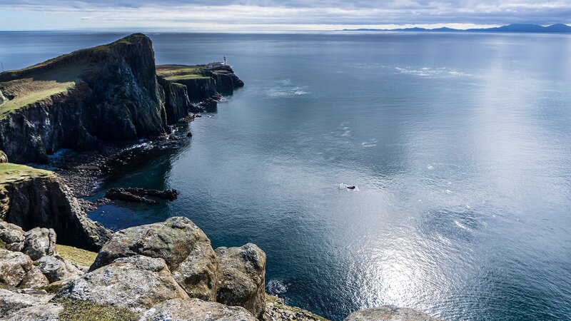 Cliffside Lighthouse — Blue, Serene, Afternoon, Photograph