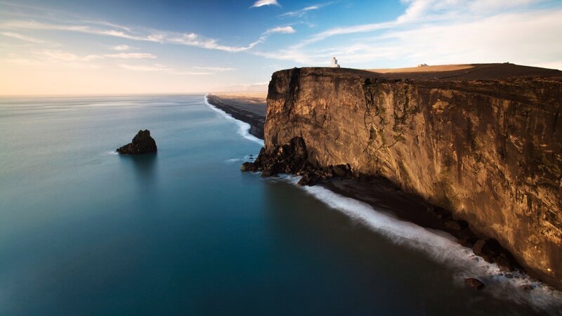Cliffside Lighthouse — Blue, Serene, Sunset, Photograph, Ocean