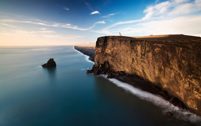 Cliffside Lighthouse — Blue, Serene, Sunset
