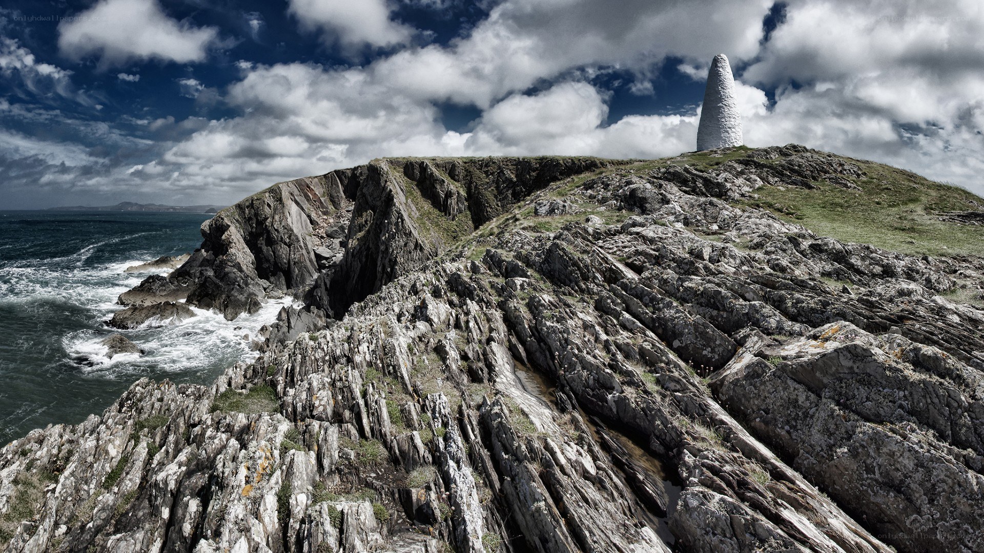 cliffside monument by the sea