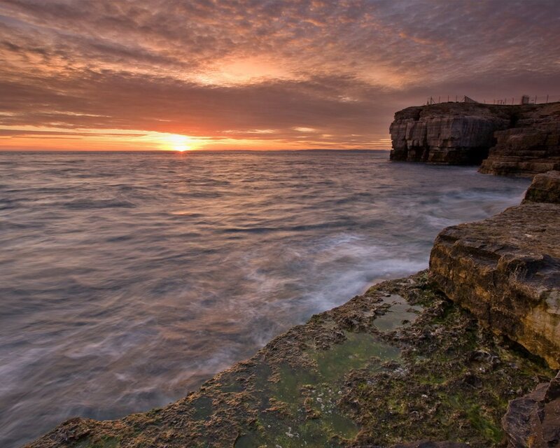 Cliffside Ocean Sunset — Orange