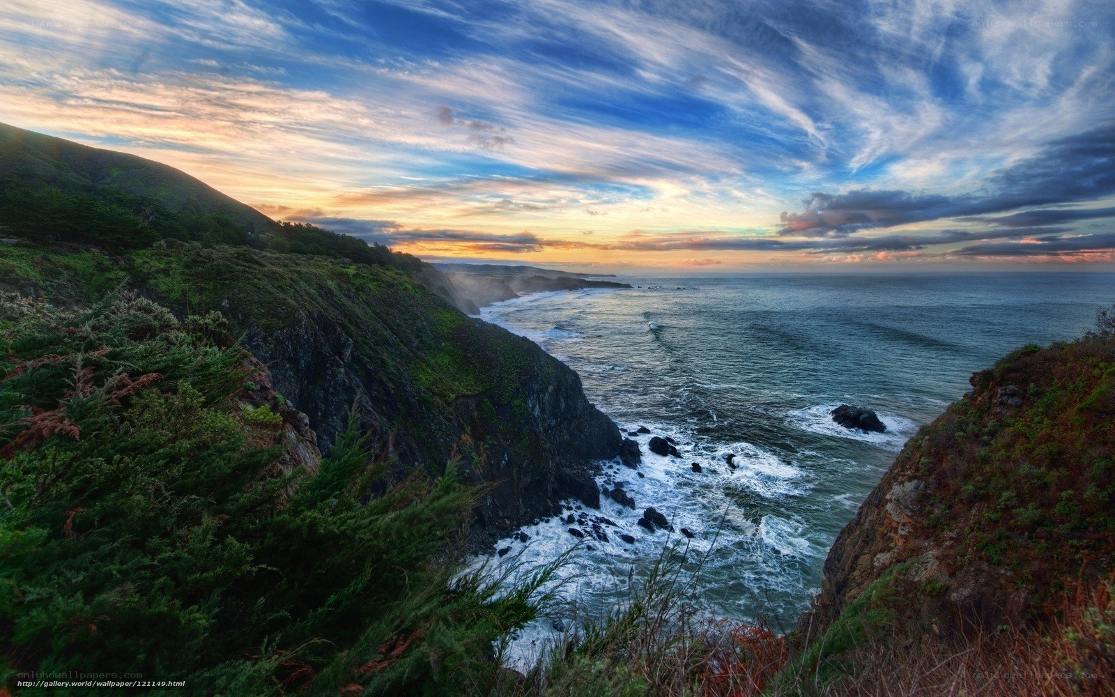 Cliffside ocean sunset