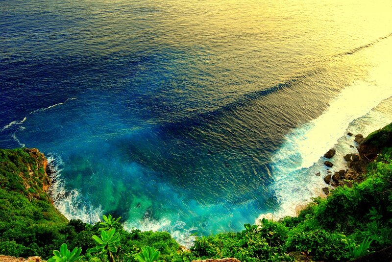 cliffside ocean view at sunset