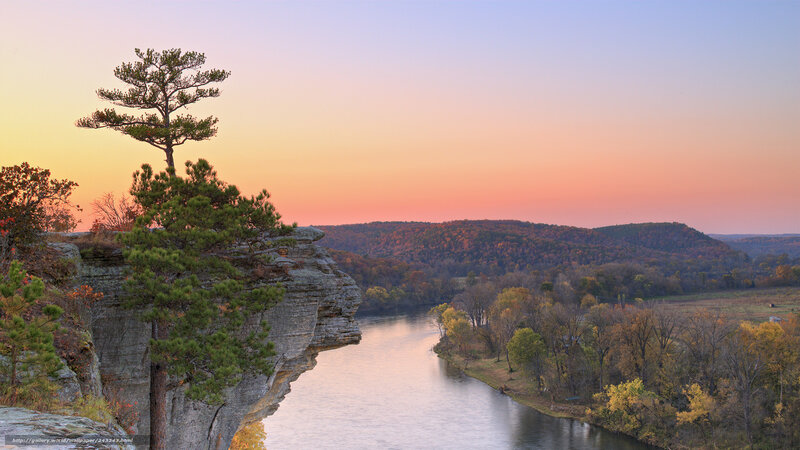 Cliffside river at sunset