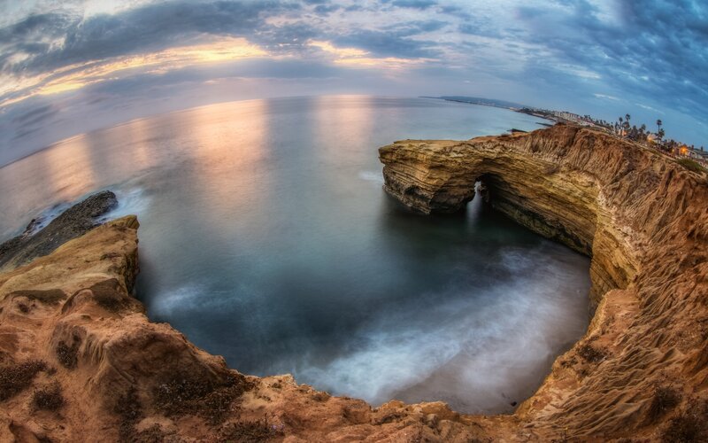 Cliffside Sea Arch — Blue