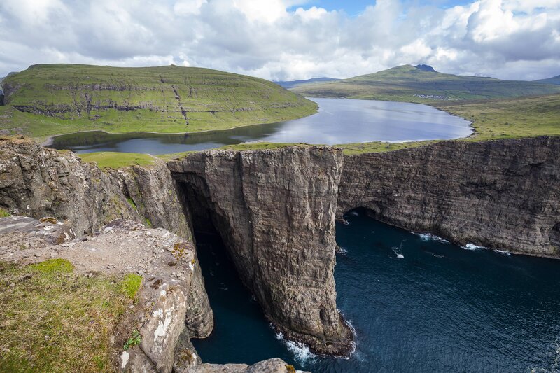 Cliffside Sea Arch — Green, Dramatic, Afternoon
