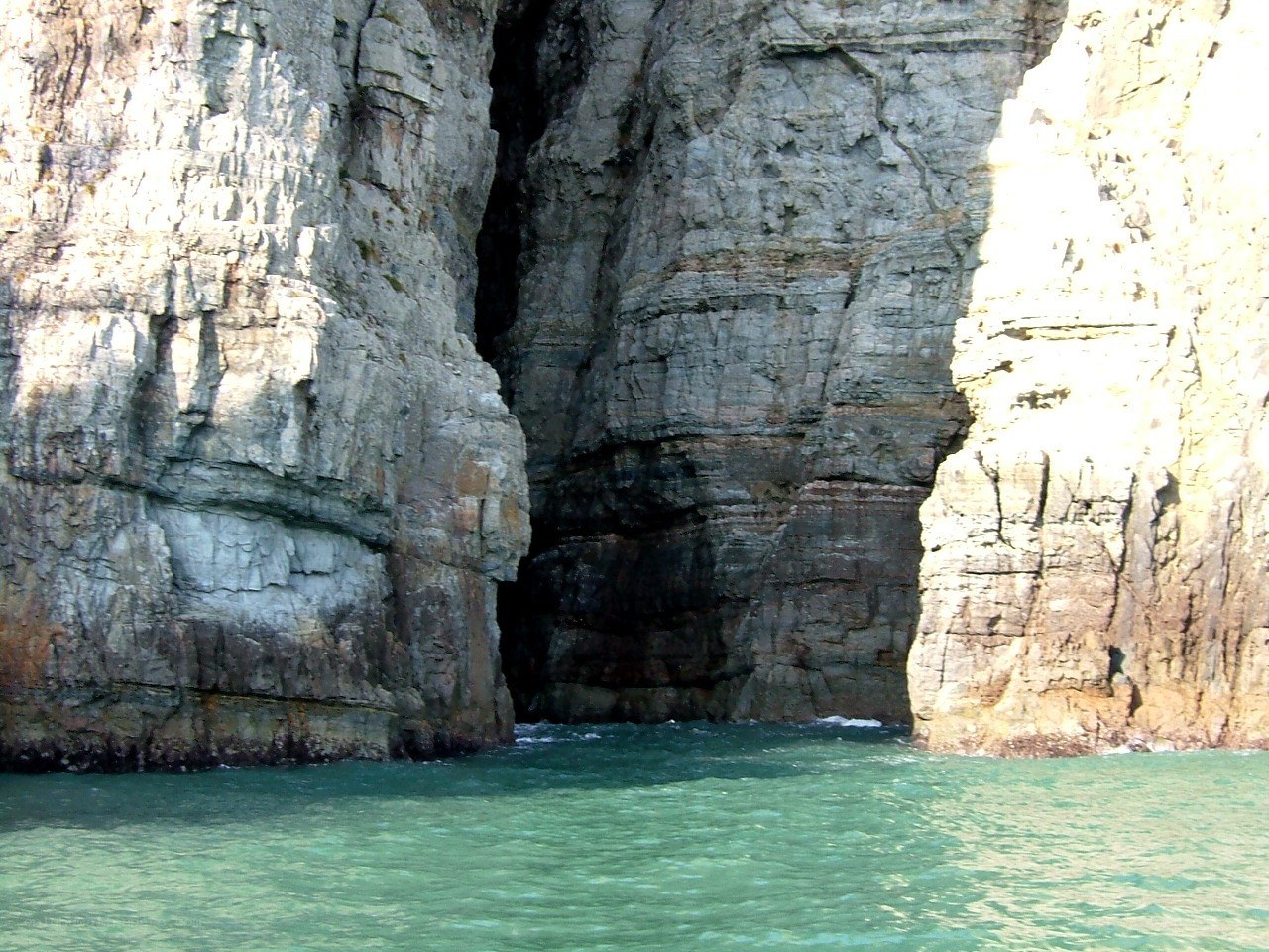 cliffside sea cave entrance