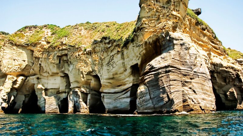 Cliffside Sea Caves — Blue
