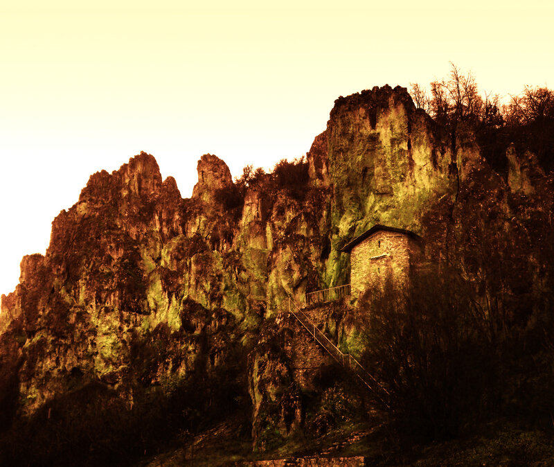 Cliffside stone building with staircase