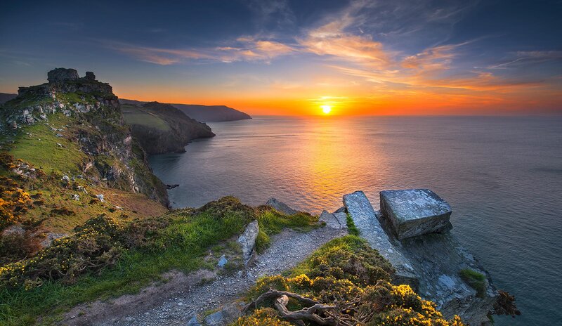 Cliffside Sunset over Ocean — Orange, Serene