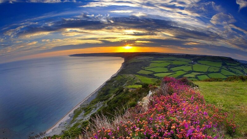 Cliffside Sunset over Sea — Blue