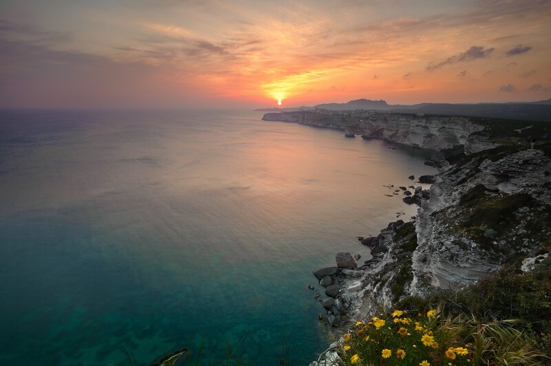 Cliffside Sunset over Sea — Orange