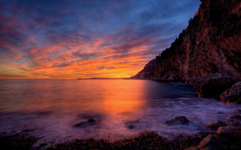 Cliffside Sunset over Sea