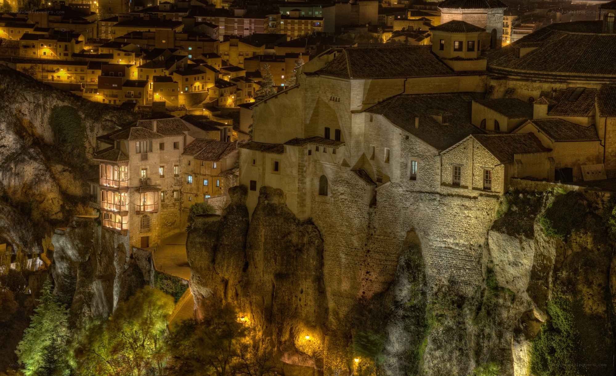Cliffside town at night