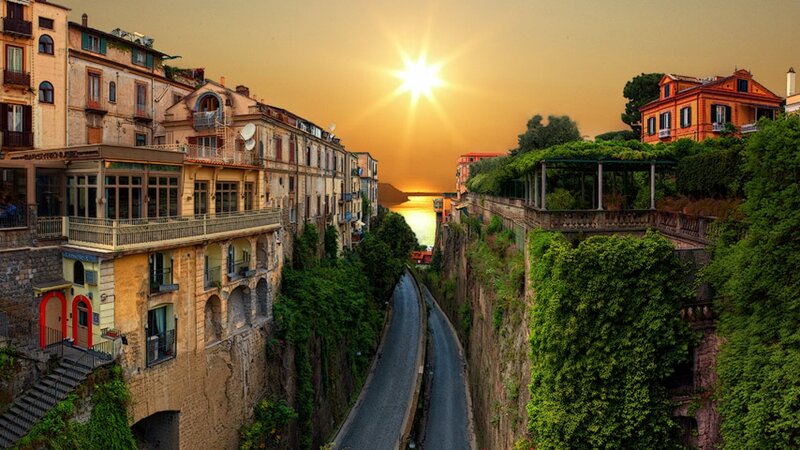 Cliffside Town at Sunset — Orange