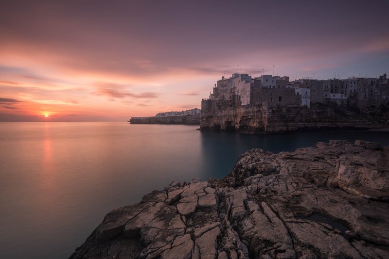 Cliffside Town at Sunset — Purple