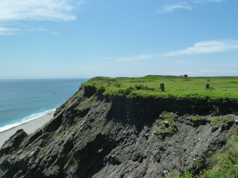 Cliffside view of a coastal beach