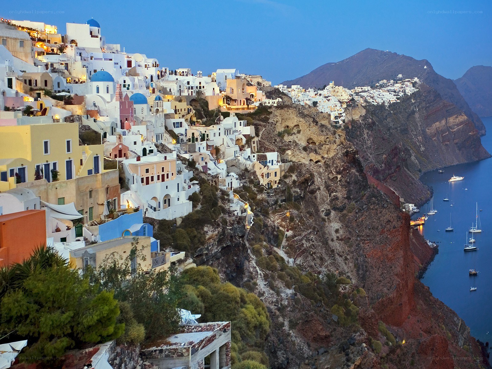 Cliffside village at dusk