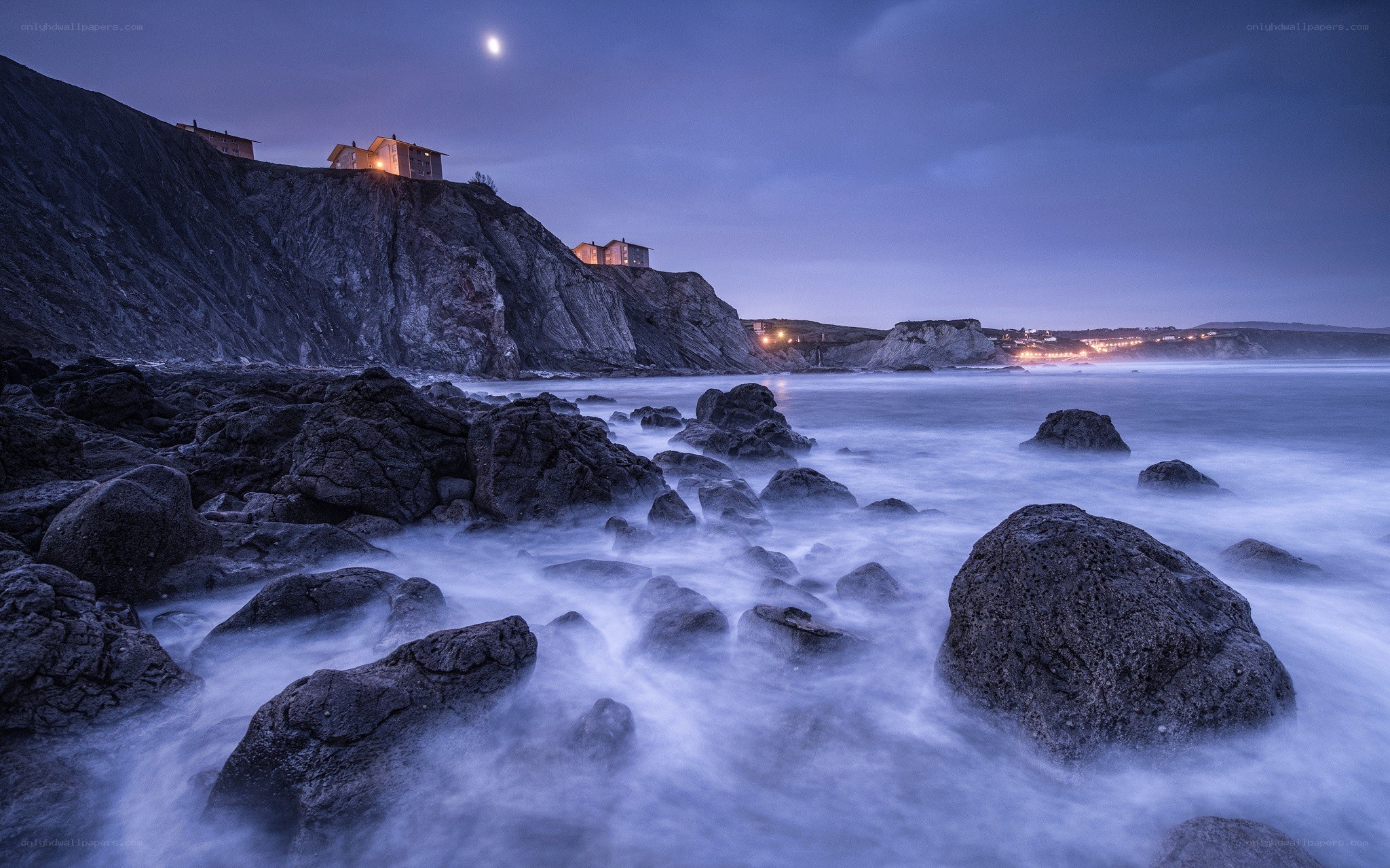 Cliffside village at dusk