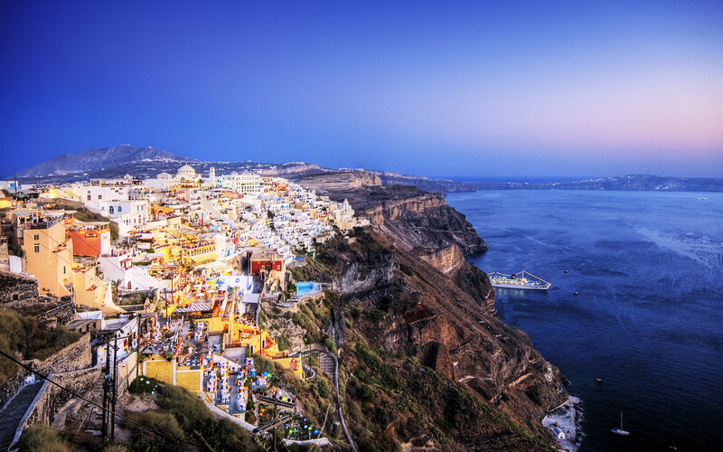Cliffside Village at Dusk — Blue, Serene, Sunset