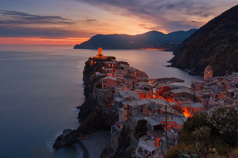 Cliffside Village at Dusk — Orange