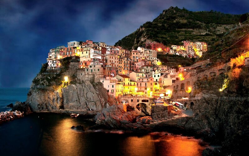 Cliffside Village at Night — Blue, Dramatic, Photograph, Sea