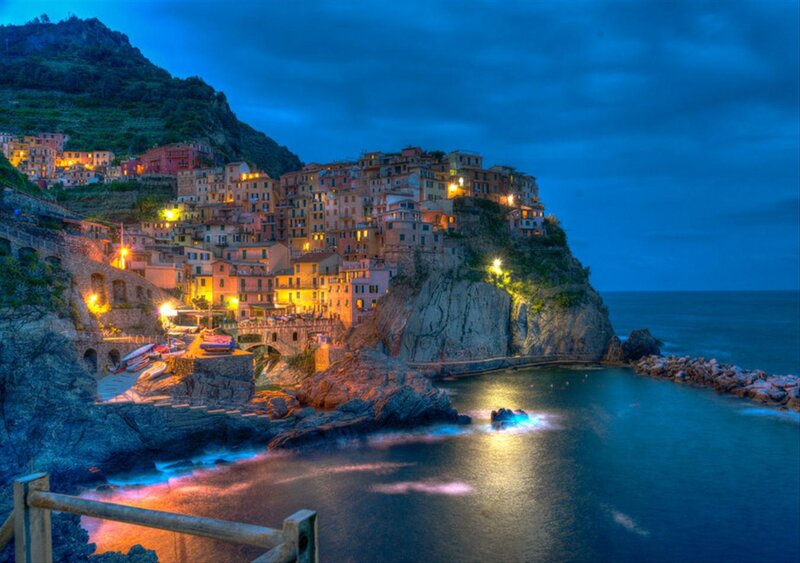 Cliffside Village at Night — Blue, Dramatic, Photograph