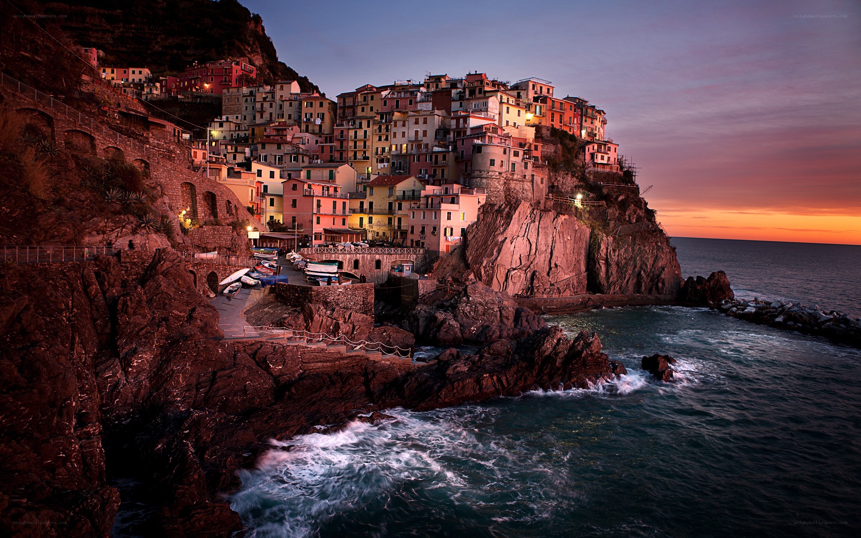 Cliffside village at sunset