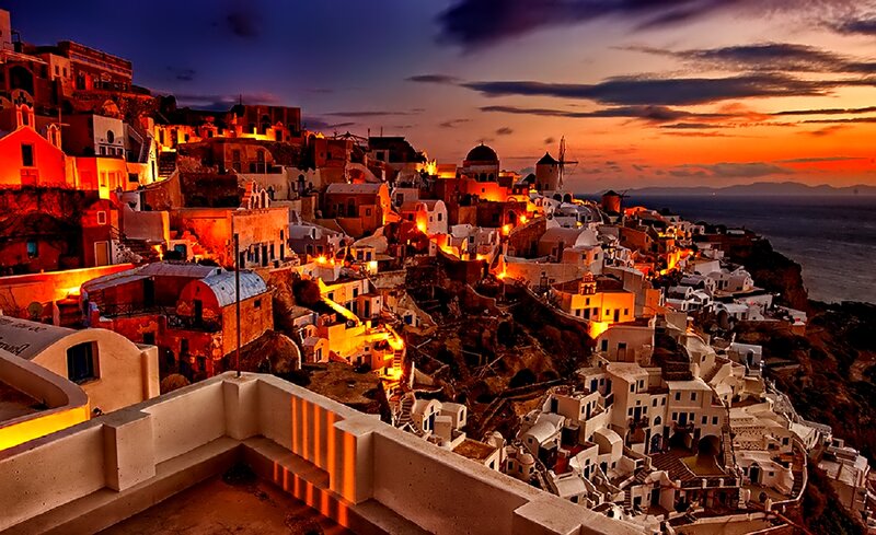 Cliffside Village at Sunset — Orange, Dramatic
