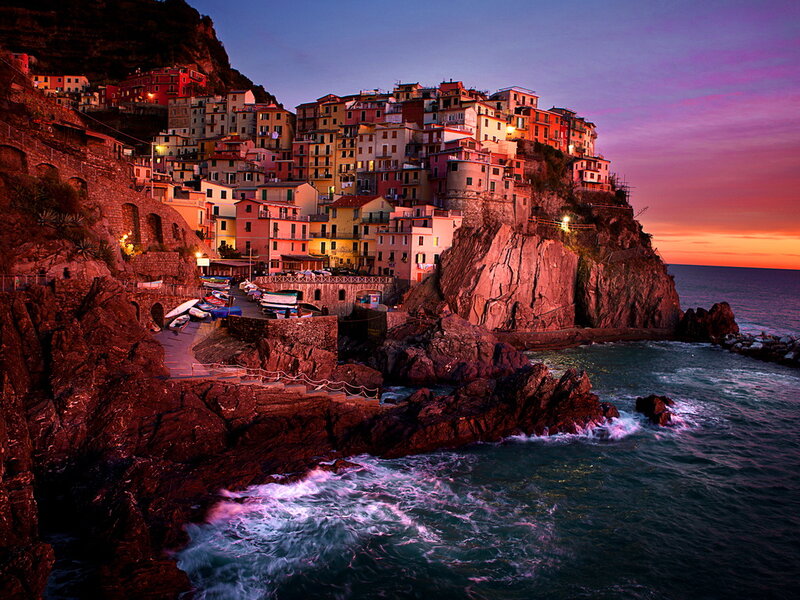 Cliffside Village at Sunset — Purple, Dramatic
