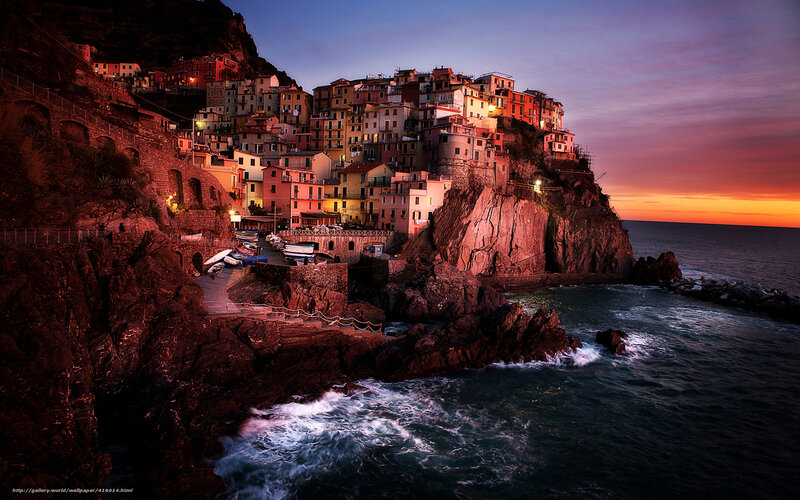 Cliffside village at sunset