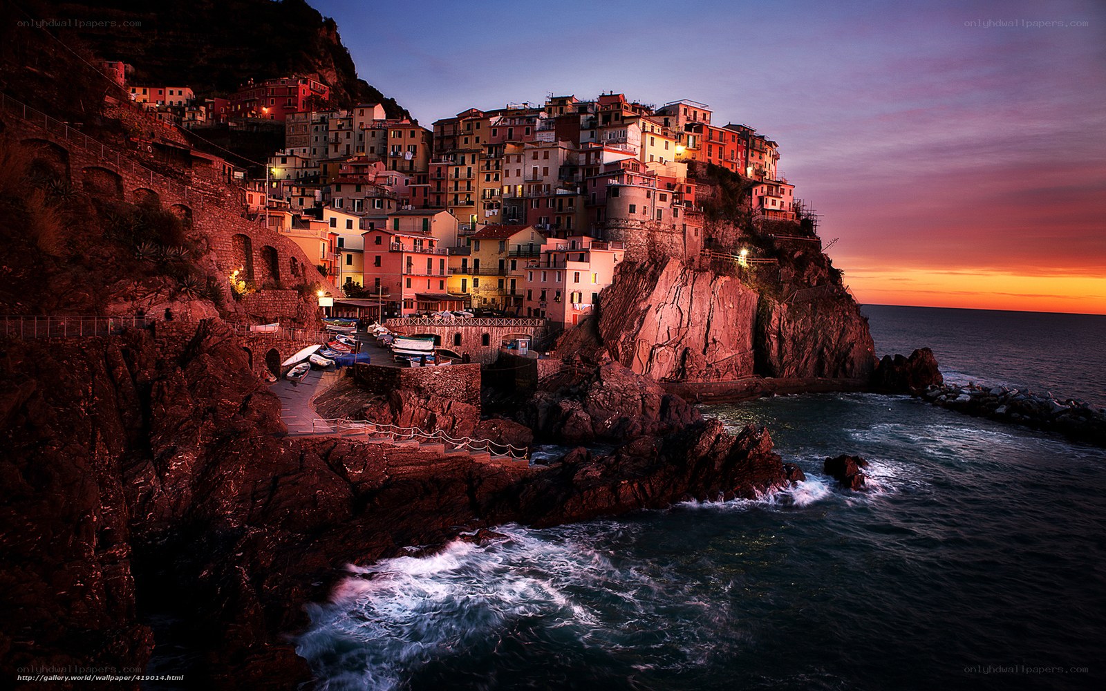 Cliffside village at sunset