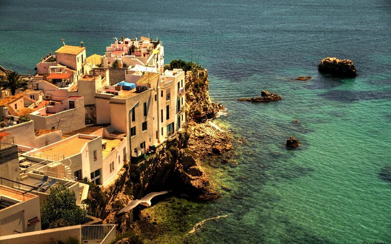 cliffside village by the sea