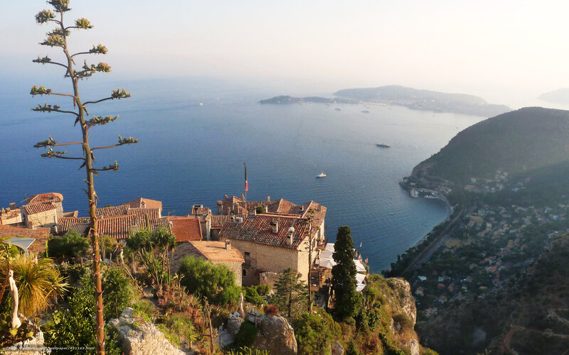 Cliffside Village Overlooking Sea — Blue