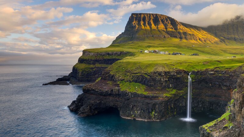 Cliffside Waterfall and Village — Green