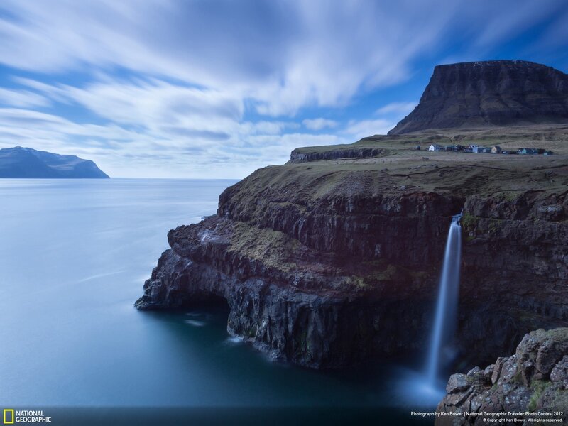 cliffside waterfall at sea