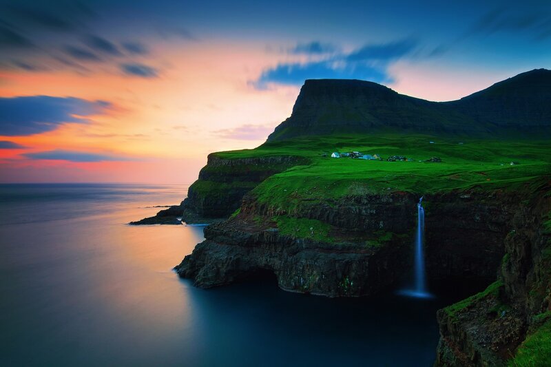 Cliffside Waterfall at Sunset
