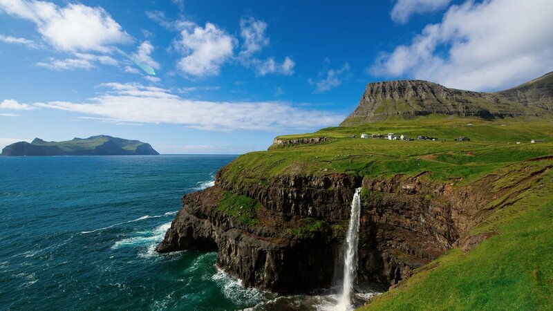 Cliffside Waterfall — Blue, Serene, Afternoon, Photograph, Ocean