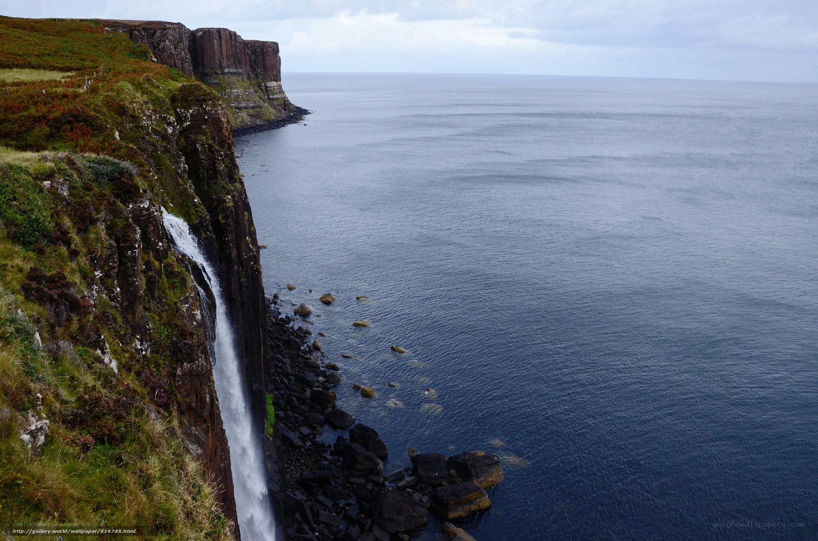 cliffside waterfall to the sea