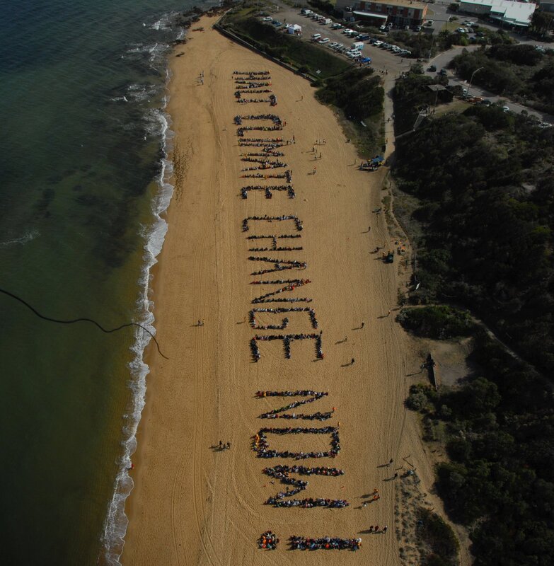 Climate change protest on beach