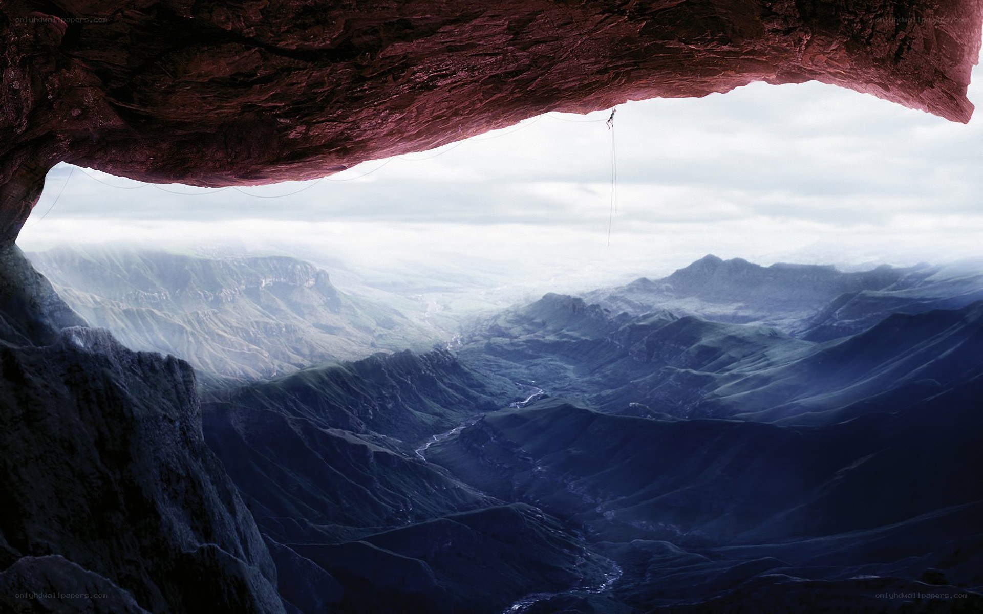 climber in a canyon cave