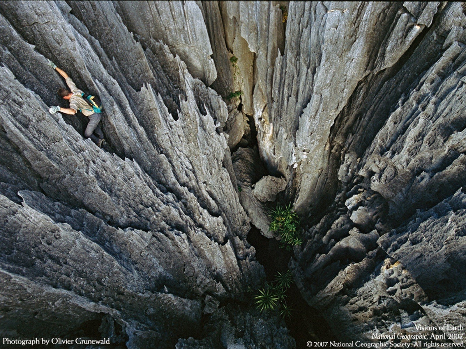 Climber in a limestone canyon