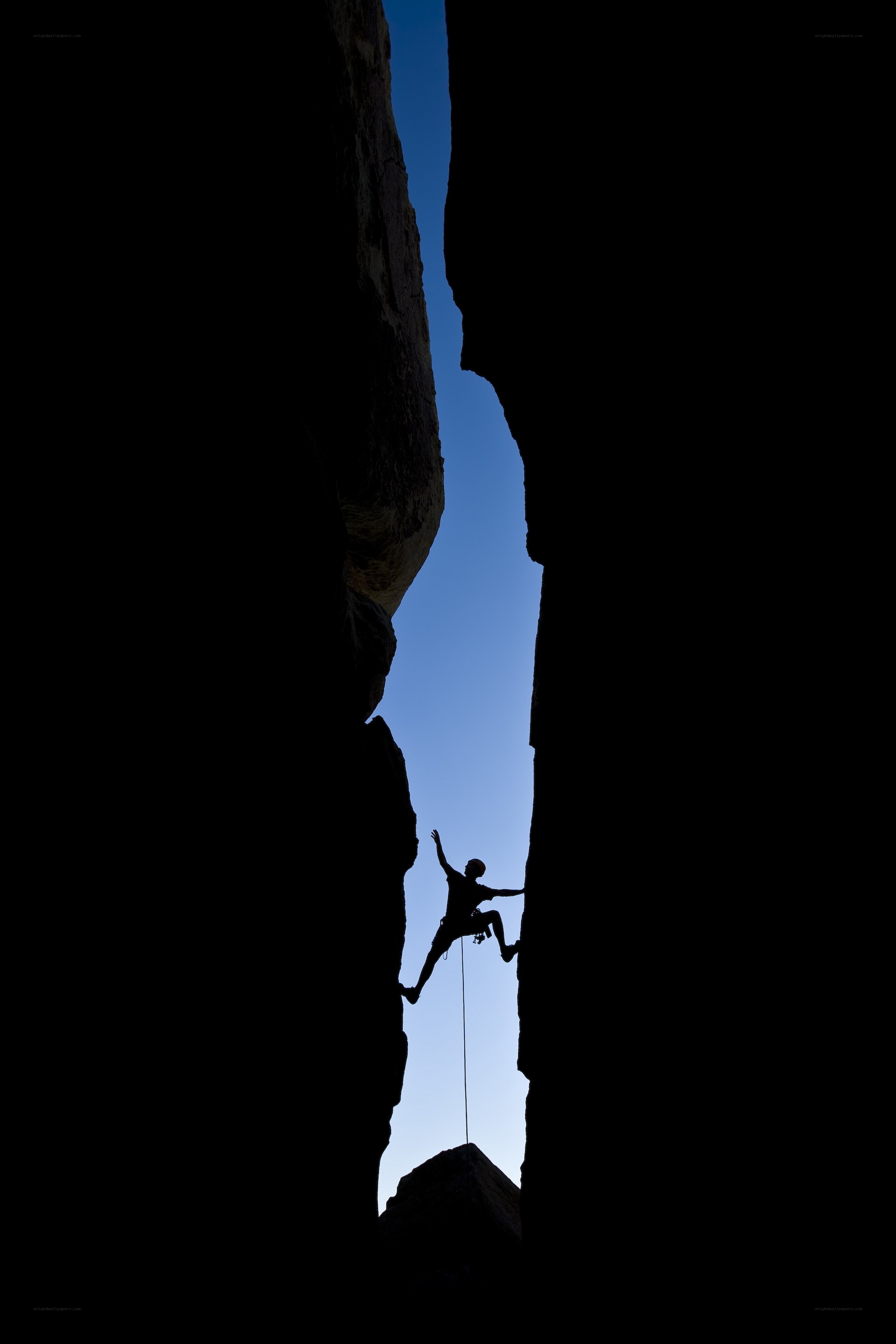 Climber in a narrow canyon